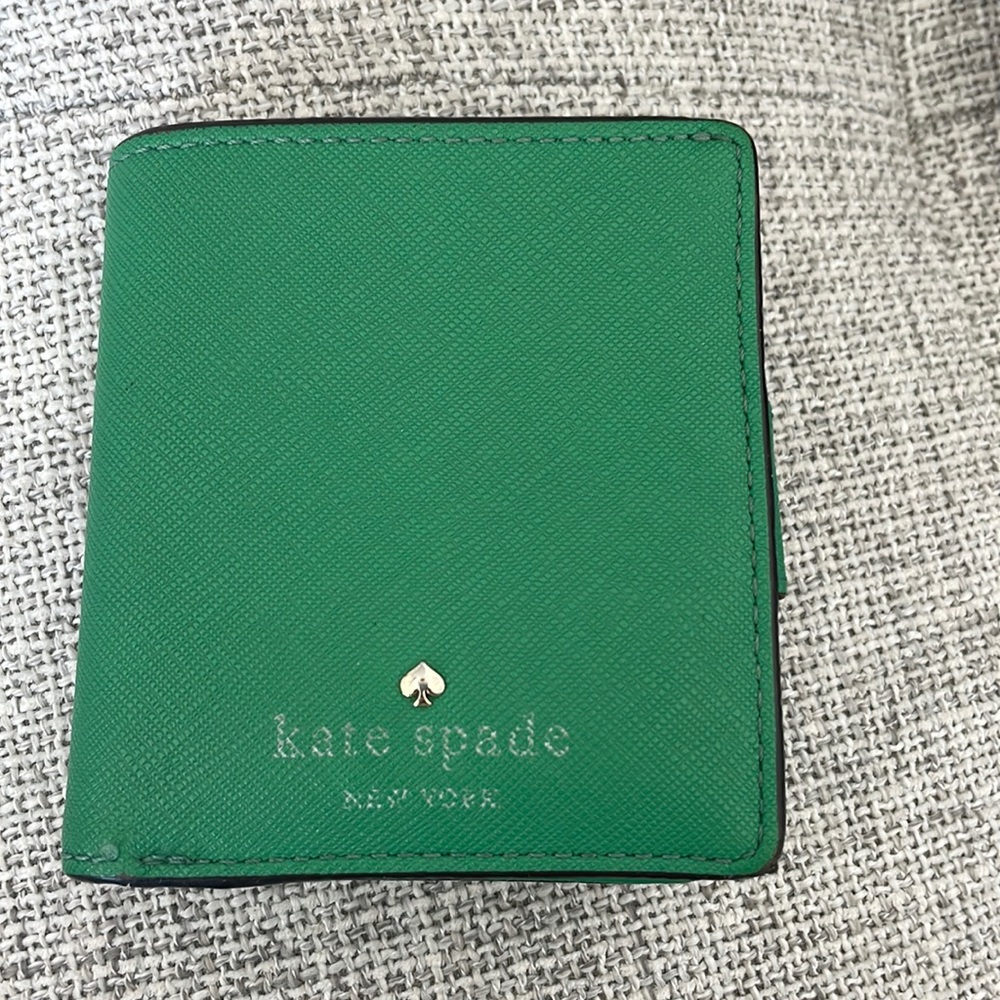 Green kate spade wallet in good condition